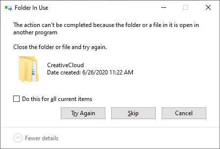 The folder or a file in it is open in another program